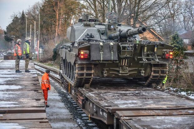 Soldiers from the Queen’s Royal Hussars are conducting a major live-firing exercise at the Hohne ranges in Germany. The exercise is part of regiment’s annual training, which also involves the transportation of heavy armour. Pictured, a Challenger 2 Main Battle Tank being loaded on to train transports in Sennelager. [Picture: Corporal Mark Webster RLC, Crown copyright]