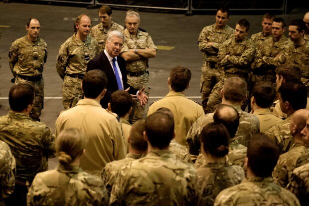 During his second visit to Cyprus, Defence Secretary Michael Fallon met RAF personnel from 903 Expeditionary Air Wing (EAW) who are providing the UK’s contribution to coalition air operations against ISIL. He discussed the campaign and spoke to the pilots who are flying twice daily missions as the UK continues to make the second largest contribution to coalition airstrikes in support of Iraqi forces. The Defence Secretary also met troops from the Second Battalion, Princess of Wales’s Royal Regiment (2PWRR) and received a briefing on the key role they are playing in the training programme to build the capacity of the Iraqi Security Forces. So far over 1000 Kurdish Peshmerga have completed training and the UK will lead the Coalition’s counter-IED training programme which is due to start this month. [Picture: Crown Copyright] 