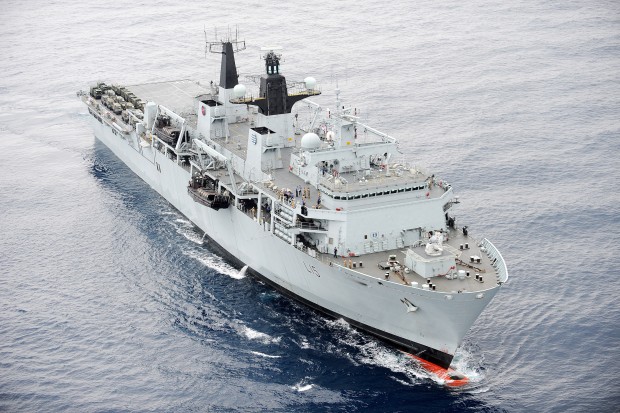 HMS Bulwark, currently deployed in the Mediterranean helping with the migrant search and rescue mission. See here, the ship was taking part in Cougar, a three month deployment, also to the Mediterranean, as part of the United Kingdom’s Response Force Task Group, exercising with key allies.