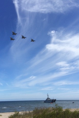 Tactical air support jets fly over NATO troops conducting beach landings in Poland as the Defence Secretary visits HMS Ocean Today as part of BALTOPS