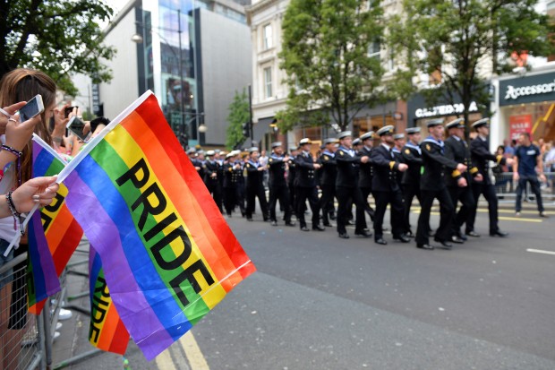 The Royal Navy contingent march through London during the London Community Pride parade. Armed Forces March in London Pride 270615 The Armed Forces marched through the streets of London today on Armed Forces Day as part of the London Community Pride parade. Prior to the event participants met with the Minister of the Armed Forces Penny Mordaunt MP and the Minister for Equalities Incumbent Caroline Dinenage MP as well as a number of Senior Military Officers at the Hyatt Regency Hotel in London. Image taken by LA(Phot) Simmo Simpson, FRPU(E), Royal Navy. Consent forms where required held by FRPU(E), HMS Excellent.
