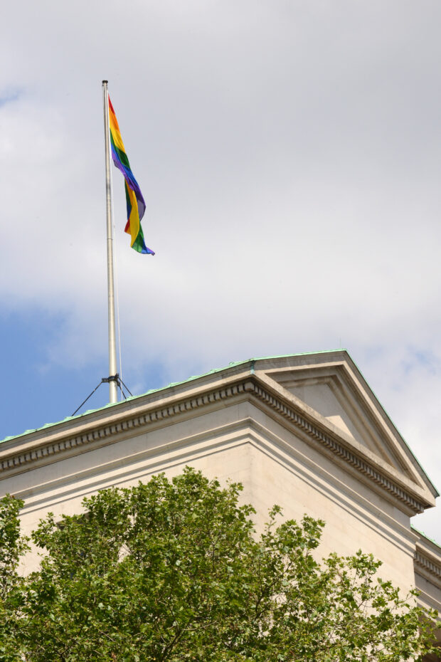 Ministry Of Defence Main Building in London flies the Rainbow Pride flag from its mast in London. Armed Forces March in London Pride 270615 The Armed Forces marched through the streets of London today on Armed Forces Day as part of the London Community Pride parade. Prior to the event participants met with the Minister of the Armed Forces Penny Mordaunt MP and the Minister for Equalities Incumbent Caroline Dinenage MP as well as a number of Senior Military Officers at the Hyatt Regency Hotel in London. Image taken by LA(Phot) Simmo Simpson, FRPU(E), Royal Navy. Consent forms where required held by FRPU(E), HMS Excellent.