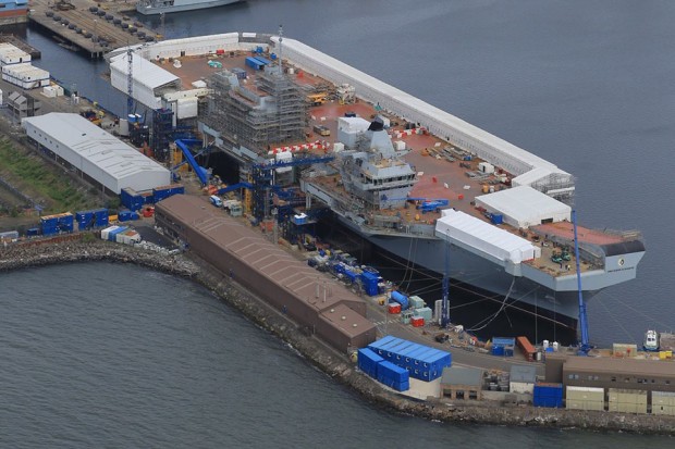A year since HMS Queen Elizabeth was named, Royal Navy personnel and industry engineers have been busy fitting her out. Meanwhile the build for the second aircraft carrier, HMS Prince of Wales, is well on the way.