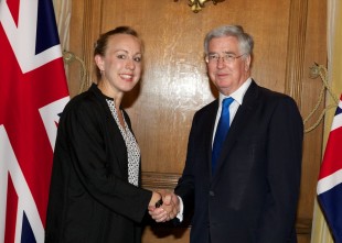 Laura Marshall from DSTL is congratulated by the Defence Secretary at Downing Street