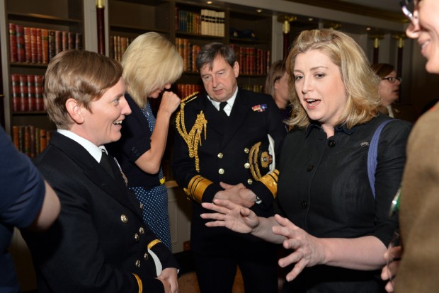 Minister of the Armed Forces, Penny Mordaunt MP talks with Sub Lieutenant Snelham and other members of the Forces at the Hyatt Regency Hotel in London. Armed Forces March in London Pride 270615 The Armed Forces marched through the streets of London today on Armed Forces Day as part of the London Community Pride parade. Prior to the event participants met with the Minister of the Armed Forces Penny Mordaunt MP and the Minister for Equalities Incumbent Caroline Dinenage MP as well as a number of Senior Military Officers at the Hyatt Regency Hotel in London. Image taken by LA(Phot) Simmo Simpson, FRPU(E), Royal Navy. Consent forms where required held by FRPU(E), HMS Excellent.