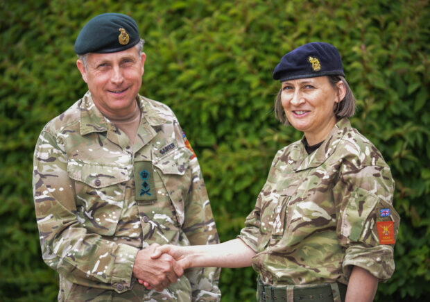 The British Army is delighted to announce the appointment of its first ever female Major General (2-Star). In September 2015, Brigadier Susan Ridge will become Major General Susan Ridge the new Director General Army Legal Services (DGALS).  Currently working as Director Legal Advisory, Brigadier Ridge and her team provide legal advice to the chain of command on discipline and administrative law. Any day will see the team advising commanding officers on disciplinary matters through to dealing with service enquiries and service complaints.   Reflecting on the recent scrutiny of the Service Complaints System, the Brigadier said: My team and I have been involved in the current System of Service Complaints and is advising the Army on the new Service Complaints System, and how we can work together to make changes for the better. This will certainly provide useful background knowledge and understanding of what is being developed for my next appointment. Pic - General Sir Nick Carter congratulates Brigadier Ridge on her new appointment.