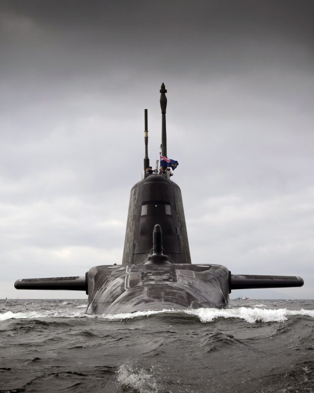 Artful, the third of the Royal Navy’s new Astute Class attack submarines has arrived at her Scottish base port from where she will carry out sea trials before entering service later this year. The 7,400-tonne Artful left BAE Systems construction yard at Barrow-in-Furness in Cumbria several days ago before sailing to her new home at Her Majesty’s Naval Base (HMNB) Clyde. She will provide the Royal Navy with the most technologically advanced submarine Britain has ever sent to sea. HMNB Clyde will become a home for the Royal Navy’s submarines and associated support by 2020, creating a submarine centre of specialisation. The base is amongst the largest single-site employers in Scotland, with 6,700 military and civilian personnel, increasing under current UK Government plans to 8,200 by 2022. Defence Minister, Philip Dunne, said: “The arrival of Artful to HMNB Clyde clearly shows that the UK Government is firmly committed to the future of defence in Scotland, this is the latest addition to what will be the home of all Royal Navy submarines by 2020. “The Astute submarine programme is a key part of our £163 billion equipment plan which has been bolstered by the commitment to increase defence spending and meet the NATO pledge of two per cent of our national income for the rest of this decade. “The Astute Class are amongst the most advanced submarines operating in the world today and provide the Royal Navy with the capability it needs to defend UK interests at home and overseas.”