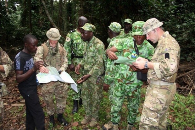 The Army training team work with native trackers