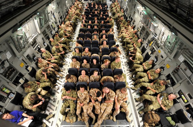 Army Photographic Competition 2015 - Winner of the Best Professional Op Herrick Portfolio category by Sgt Rupert Frere. Crown Copyright. Soldiers serving with 16 Air Assault Brigade, seated on a Royal Air Force C17 for the final leg of their journey to Afghanistan.