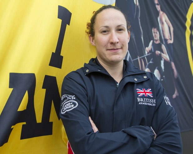 Invictus Games Sitting Volleyball Event - Sun 14 Sep 2014 Image shows Michaela Richards in front of Invictus Games adverts. Michaela has won 2 golds in Atheletics and 1 bronze in the powerlifting. Mickaela Richards suffered hip, pelvis and right shoulder dislocation during a training accident while serving with the Royal Navy. Since then, she has competed in various Athletics events including the 2012 Warrior Games in the USA. She has also competed in Track and Sitting Volleyball at 2013 Warrior Games. Richards will be representing the British Armed Forces Team in Athletics. Image taken by: POA(Phot) Owen Cooban Navy PR Photographer Directorate Of Defence Communications MOD Main Building Whitehall London SW1A 2HB