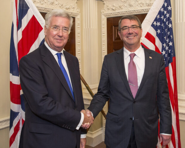 Pictured: L-R: Michael Fallon and Ashton Carter meet at the Ministry of Defence Main Building in London. Visit by US Secretary of Defence, Ashton Carter, visits Secretary of State for Defence, Michael Fallon at the Ministry of Defence in London.