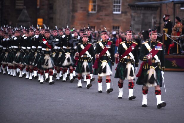 Soldiers and Officers of the Royal Regiment of Scotland march off parade into the Castle in Edinburgh.