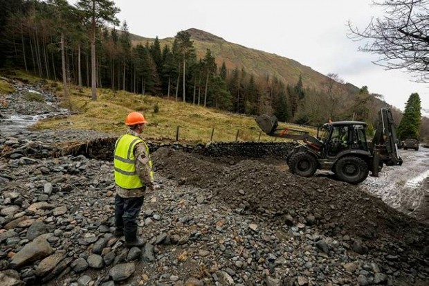 Moving debris from the flooding left on roads in the Lake District is a mammoth task and the Royal Engineers have joined Cumbria County Council Highways in the big clear up. 