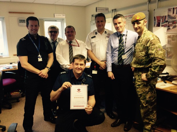 Maj Davies and other members of the TCG receiving the “Star of the Week” Award