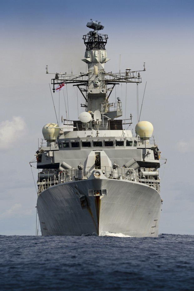 Pictured is HMS Lancaster sailing towards the camera, at sea. HMS Lancaster was built on the Clyde as the fourth of the Type 23 frigates joining the Fleet in 1992. This versatile multi-role ship can typically be deployed drug-busting in the Caribbean or East of Suez on maritime security patrols. All the ships in the Type 23 class are named after Dukes, in this case, the Duke of Lancaster  who is also better known as Her Majesty the Queen. The British Monarch is the ship's very special sponsor and Her Majesty takes a keen interest in Lancaster's activities around the globe. In 2013, HMS Lancaster spent seven months in the North Atlantic and Caribbean, successfully seizing drugs worth a total street value of £160m. During six raids, the ship intercepted 1.2 tonnes of cocaine and almost 1.5 tonnes of cannabis. 23 drug runners were detained, effectively disrupting the distribution of drugs throughout the region. Lancaster visited all six of the British Overseas Territories in the region and the Commonwealth states of Jamaica, Belize and Barbados while also making calls into the islands of Curacao, Martinique and visiting Columbia in South America. The ship also took part in Exercise Unitas a multi-national exercise involving 16 warships and submarines from nine nations ranging from Canada to Chile. On returning from her deployments HMS Lancaster is often greeted, wherever possible, by a Lancaster bomber of the RAF Battle of Britain Memorial Flight, which provides a fly past over Portsmouth harbour. *** Local Caption *** Pictured is HMS Lancaster afer her last Replenishment at sea (RAS) with RFA Gold Rover.