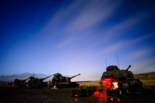 Pictured: 17 (Corunna) Bty lined up ready to fire at night. Over 350 soldiers from 26 Regt RA conduct Ex MANSERGH SABRE, a collective training exercise in preparation for their forthcoming training year (2016). This will lead directly into Ex STEEL SABRE 16. Photographer: Cpl Timothy Jones RLC Crown Copyright 2016