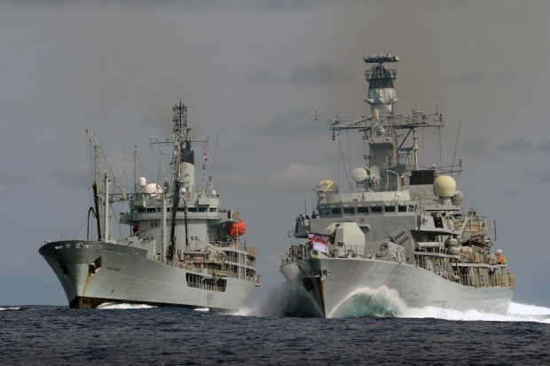 Pictured are, on the left RFA GOLD ROVER, and on her right HMS LANCASTER sailing together on Atlantic Patrol Task (South) duties in 2015. Crown Copyright