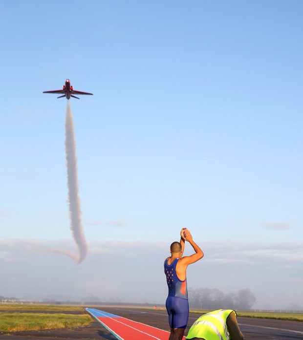 A BRITISH Olympic sprinter raced a Red Arrows jet to demonstrate the science of acceleration and speed for a new ITV television show. Adam Gemili ran side-by-side with an aircraft from the Royal Air Force Aerobatic Team, as the jet took off from a runway. Image created by SAC Gina Edgcumbe