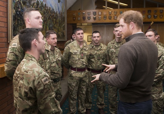 Prince Harry has thanked troops who worked on the recent flood protection and relief efforts which hit parts of northern England. His Royal Highness visited soldiers at their base in Weeton Barracks, near Blackpool in Lancashire, earlier today to meet soldiers from the 2nd Battalion The Duke of Lancasters Regiment (2 LANCS). The unit is currently the UK's standby battalion and was at the forefront of the military operations, which provided support to flooded communities throughout December. Pictured:Soldiers from the LANCS chatting to Prince Harry about their experiences during the flood relief.