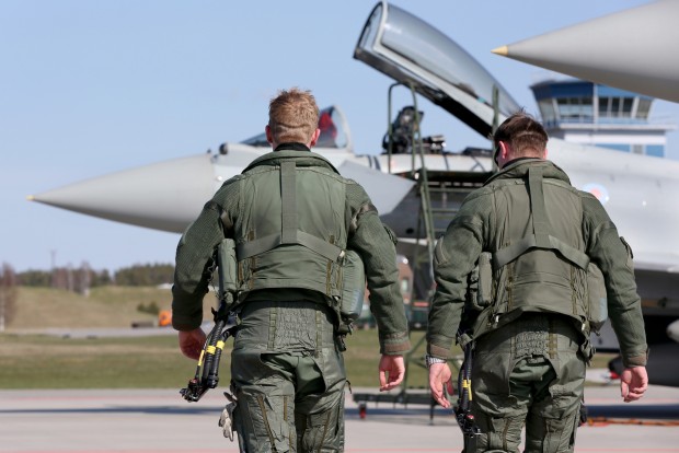 The UK has taken up a leading role policing the skies over the Baltic states to deter threats such as aggression from Russia. The Defence Secretary has announced today that four Royal Air Force (RAF) Typhoons, flying from the Amari airbase in Estonia, will join the NATO Baltic Air Policing (BAP) mission until the end of August. The jets, alongside pilots and engineers, will be on 24/7 stand by to launch a Quick Reaction Alert (QRA) in response to any aggression directed from Russia, or others. Two of the four Typhoons will be ready to take off at moments notice to provide security to the airspace over Estonia, Latvia and Lithuania. Two Typhoon pilots of 2 (Army Co-Operation) Sqn after arriving at Amari Air Base in Estonia prior to undertaking the Baltic Air Policing mission for NATO. Operation Azotize is the operation for the Royal Air Force in which they undertake the NATO commitment of the Baltic Air Policing. A Quick Reaction Alert to protect the airspace over Estonia, Latvia and Lithuania. The Detatchment Commander is Wing Commander Gordon Melville and he is Commander of 140 Expeditionary Air Wing, which is the support element of the Operation to enable RAF Typhoons of 2 Squadron, written as " II(Army Co-operation) Sqn" to provide the QRA cover. II(AC) Sqn are usually based at RAF Lossiemouth in Northern Scotland but are operatin out of Amari Air Base in Estonia for the next four months. Image by Cpl Graham Taylor (RAF) Crown Copyright 2016
