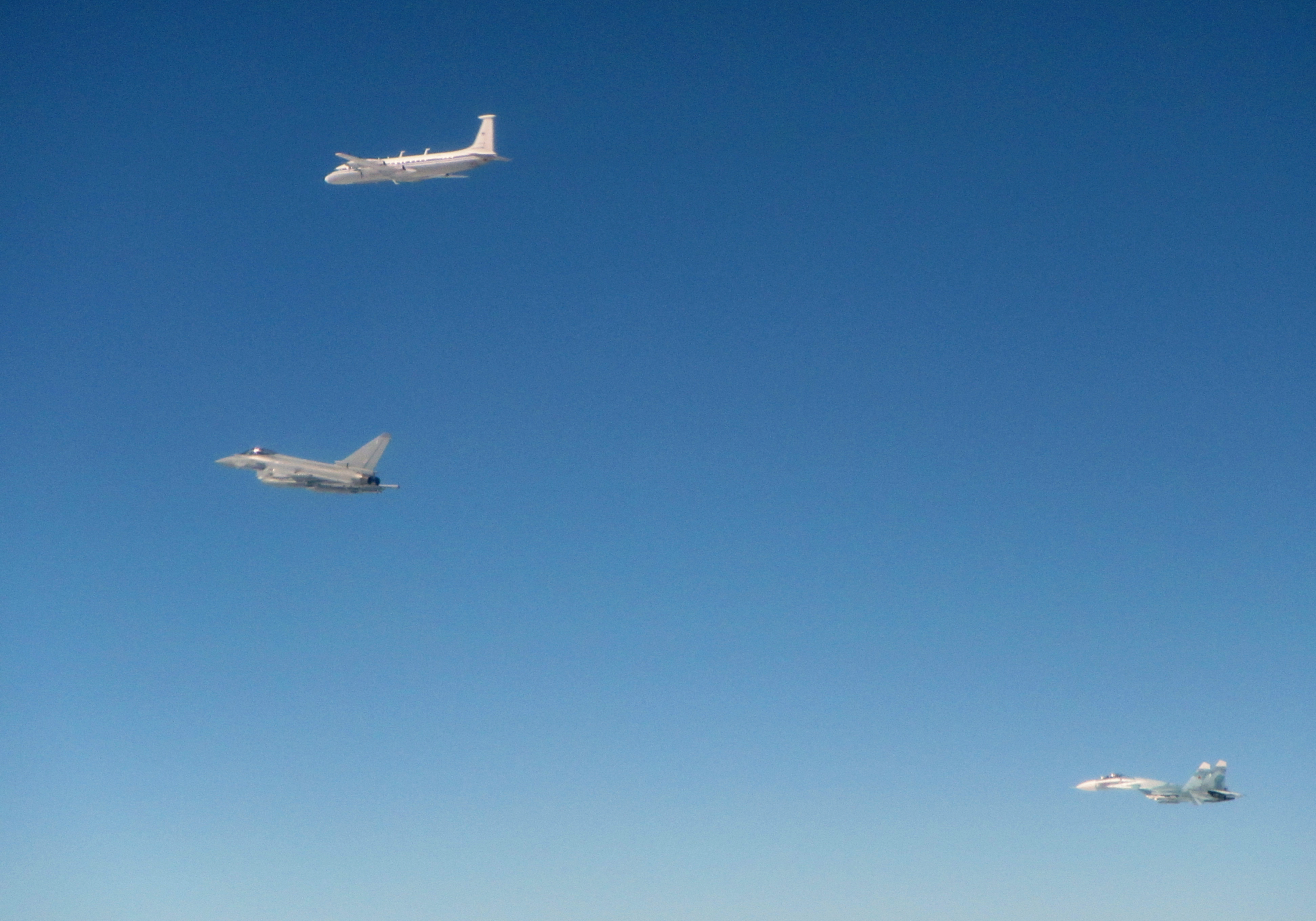 Russian Coot-A communications aircraft (top) and Su-27 Flanker fighter (lower right) intercepted by Royal Air Force Typhoons (centre) within NATO's area of interest near Estonia on 17 May 16. Royal Air Force Typhoons stationed in Estonia as part of the NATO Baltic Air Policing mission have scrambled for the second time during their current deployment to intercept Russian aircraft in NATO's area of interest. The Typhoons scrambled on 17 May to investigate five unresponsive Russian aircraft over international waters. The Russian aircraft - identified as four Su-27 Flanker fighters and one Coot-A communications aircraft - were not communicating with air traffic control, and did not transmit a recognised identification code.
