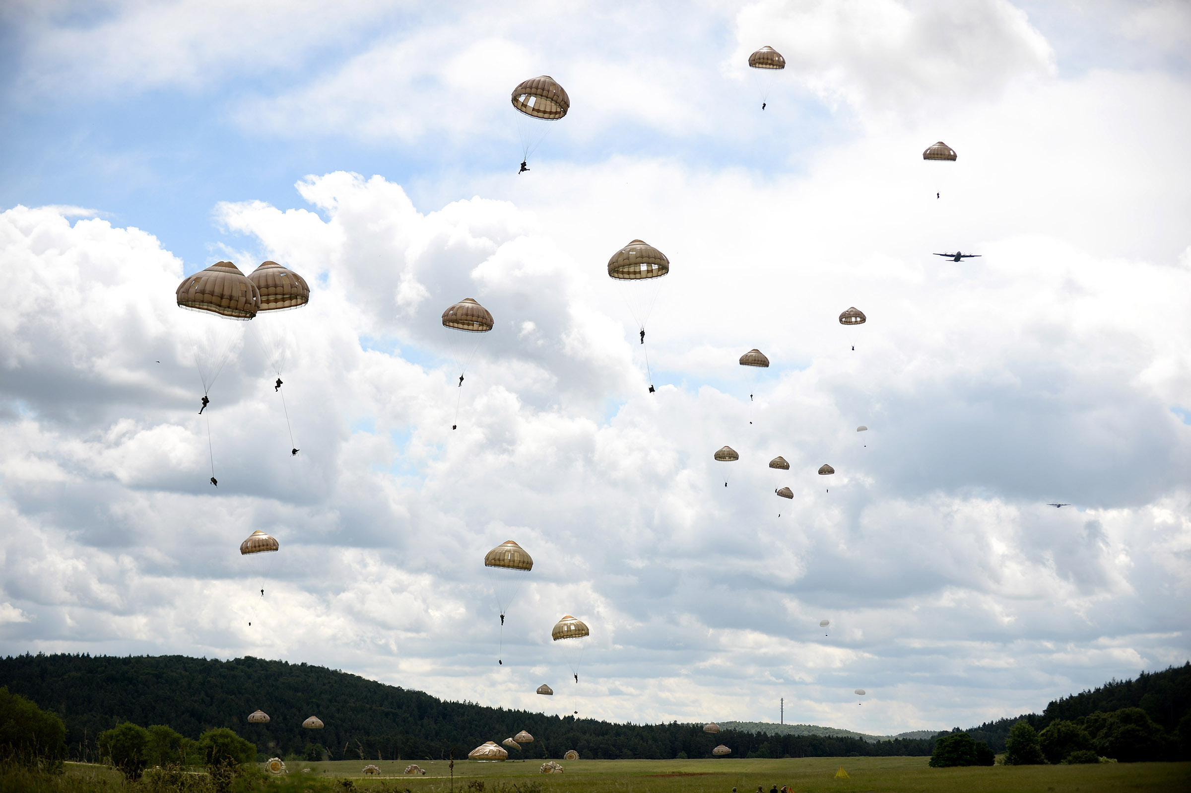   British airborne forces are training alongside NATO counterparts to develop their ability to work together to deliver a Swift Response to international crises. 16 Air Assault Brigade is on Exercise Swift Response, which brings together more than 5,000 personnel from 10 nations and takes place in Poland and Germany between May 27-June 26, 2016. Under the command of Headquarters 16 Air Assault Brigade some 2,000 troops are taking part, the largest British contingent to deploy on a NATO exercise in 2016. The joint force includes 3 PARA Battlegroup, including engineer, artillery, logistics, signals, medical, provost and ISTAR support; Apache attack helicopters from 4 Regiment Army Air Corps; and RAF Chinook and Puma support helicopters and C-130 Hercules transport aircraft. The training involves mass parachute jumps and air assault operations as part of a simulated mission to restore stability to a troubled region. It is key to developing interoperability with 82nd Airborne Division and 11e Brigade Parachutists, the Brigades key partners in the US and French armies respectively, as well as wider allies. NOTE TO DESKS: MoD release authorised handout images. All images remain crown copyright. Photo credit to read - Corporal Andy Reddy RLC Email: andyreddy@mediaops.army.mod.uk richardwatt@mediaops.army.mod.uk shanewilkinson@mediaops.army.mod.uk