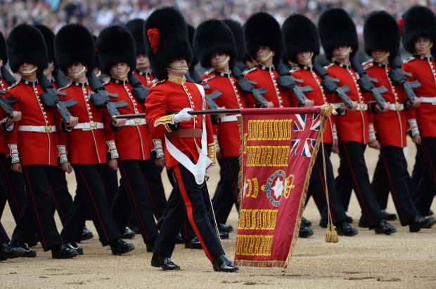 Almost fifteen hundred soldiers from the Household Division were on parade to mark the Queen’s Official 90th Birthday on 11th June 2016 on Horse Guards Parade, at the ceremony known as Trooping the Colour. All the Royal Colonels accompanied Her with The Prince of Wales, The Duke of Cambridge, and The Princess Royal also riding on the parade. This year, the Colour being trooped in the presence of Her Majesty The Queen is that of Number 7 Company Coldstream Guards. The Field Officer in Brigade Waiting, Lieutenant Colonel James Thurstan, Coldstream Guards, commanded the Parade. The Soldiers were on parade in their traditional ceremonial uniforms of the Household Cavalry, Royal Horse Artillery, and Foot Guards. The musicians in the Household Cavalry Band and the Drum Majors were in their priceless Gold Coats. There was more than 300 horses on parade, and musicians from all the Household Division Bands & Corps of Drums marched and played as one. The famous Drum Horses of the Household Cavalry Band carrying priceless antique solid silver drums weighing 80lbs each were also on parade.