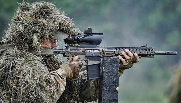 A sniper takes aim at the International Sniper Competition