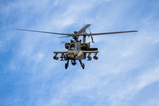 A U.S. Army AH-64E Apache helicopter, assigned to 16th Combat Aviation Brigade, 7th Infantry Division, provides aerial support to ground forces during Bellator Stakes 2016 at Joint Base Lewis-McChord, Wash., May 12, 2016. Bellator Stakes is an annual exercise conducted by 46th ASB, which provides 16th CABs sustainers an opportunity to hone tactical and technical skills in a field environment.