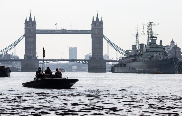 History and technology combined on the Thames in London today when the British Armys Royal Engineers took to the water to support the worlds oldest boat race. The soldiers, in a range of military waterborne craft  support vessels and rigid raiders  used the Doggett's Coat and Badge rowing race to practise their real life navigation, safety and recovery skills, as they provided marine support to the colourful spectacle.