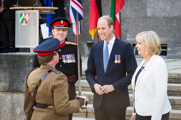 The Duke of Cambridge visited Düsseldorf on Tuesday 23rd August to attend a series of events honouring the role of the British Forces in Germany, and celebrating the 70th anniversary of the state of North Rhine-Westphalia (NRW). During the visit, His Royal Highness saw a military parade with NRW Minister President Hannelore Kraft, met BFG personnel at a reception, and attend a 70th anniversary gala alongside Chancellor Angela Merkel. The events of the 23rd August in Düsseldorf will celebrate both the historic and current ties between NRW and Britain. To commemorate Britain's military contribution, The Duke will see NRW Minister President Hannelore Kraft present the Fahnenband, the Federal state's highest military honour, to 20th Armoured Infantry Brigade, in acknowledgment of their service to the defence of Germany. Following the parade, His Royal Highness will attend a reception in Düsseldorf's NRW Forum, where he'll meet members of the Brigade and their families. The soldiers on Parade forming the Honour Guard are from the 1st Battalion Princess of Wales's Royal Regiment based in Barker Barracks Paderborn. The Pennant Party comprises two Officers and two SNCOs from Headquarters 20 Armoured Infantry Brigade. The musical accompaniment is being provided by the Band of the Grenadier Guards. Photographer; Mr Dominic King Army Press Office Germany Info; NRW was established on 23rd August 1946 by the British Military Government, following the end of the Second World War, Operation Marriage merged the regions of North Rhine and Westphalia together. For almost 70 years, a large British military presence has remained in the region  known as British Forces Germany  playing a vital role during the Cold War and in the reconstruction of its area of occupation. The strong links between NRW and Britain remain today, with approximately 27,000 British citizens living in the state, and 345 British firms basing their companies here. The end of Second Worl