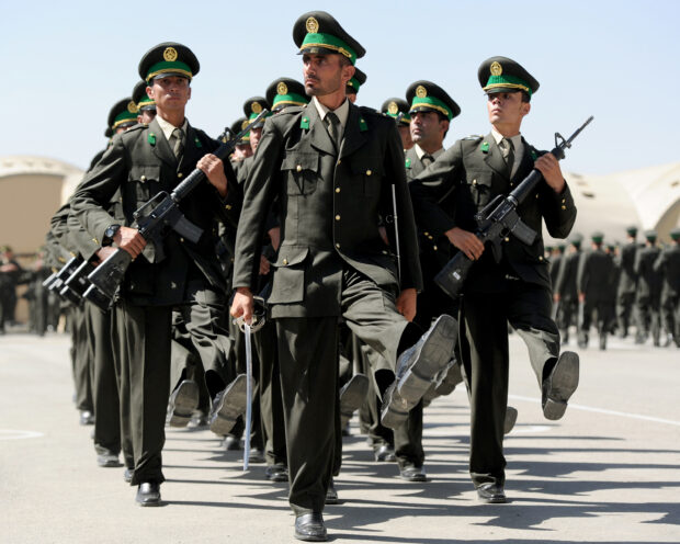 Date:20140922 Image Shows: Members of the First Kandak, equivalent to a British Army battalion at their graduation parade from the Afghan National Army Officer Academy (ANAOA ) situated outside Kabul, Afghanistan. The first cadets from Afghanistans British-mentored officer academy are ready to secure their countrys future after completing their training, the Defence Secretary has said. Michael Fallon MP witnessed the passing out of the first intake of the Afghan National Army Officer Academy (ANAOA) at its mountainside base near Kabul today (Wednesday 24 September). He met a number of the 243 graduates, drawn from across Afghan society, who were selected from an initial pool of 10,000 to attend the 42-week leadership course which is inspired by the ethos of the Royal Military Academy Sandhurst but tailored to Afghan experience.