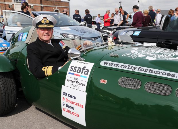 Naval Secretary Rear Admiral Williams in one of the competitors cars.