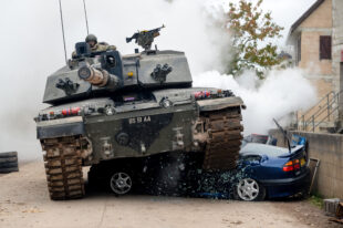 Troops from 1 RRF and RWxY conduct a combined arms assault on Copehill Down urban operations training area.