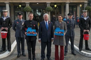 London Poppy Day kicks off in Covent Garden. Pictured left to right (flanked by RAF and Royal Navy collectors) are, Lance Corporal Richard Jones, Defence Secretary Michael Fallon and Soprano Laura Wright. Crown Copyright.