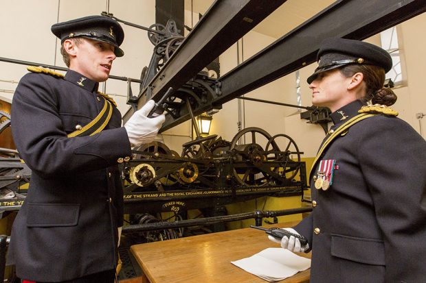 Signallers from 251 Signal Squadron, 10 Signal Regiment, inside Elizabeth Tower in the Palace of Westminster, rehearsing for the their role for Remembrance Sunday, where they signal to the guns on Horse Guards Parade and the bugler on Whitehall. L-R: Lieutenant Thompson and Captain Keddie.