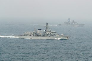 HMS Sutherland, seen here in the foreground, escorting the Yaroslav Mudry, seen in the background. 