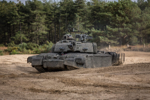 The UK Main Battle Tank, Challenger 2 Theatre Entry Standard (CR2 TES) fitted with a Mobile Camouflage System (MCS). Crown Copyright.