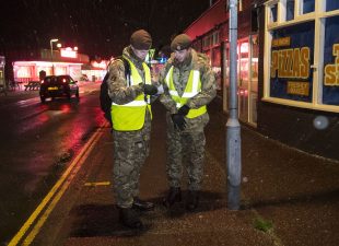 Troops from the Kings Royal Hussars deployed to Hemsby on Friday to warn and inform residents about the threat of coastal flooding. 