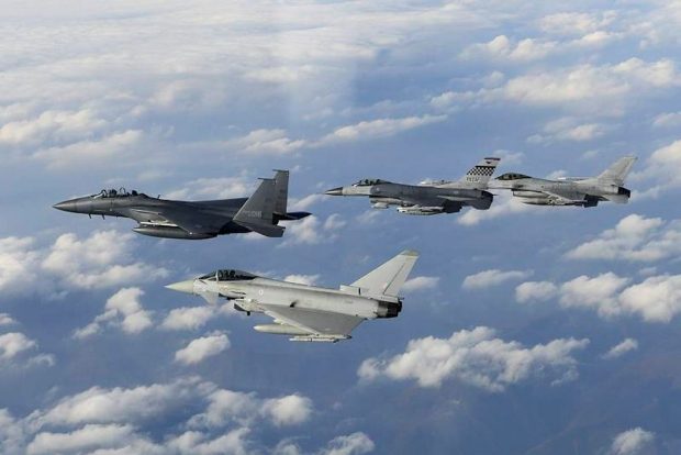 An RAF Typhoon flies with Republic of Korea (RoK) and US aircraft over RoK in 2016