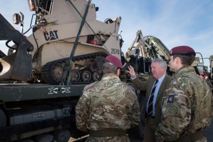 Armed Forces Minister Mike Penning with troops from 16 Air Assault Brigade yesterday