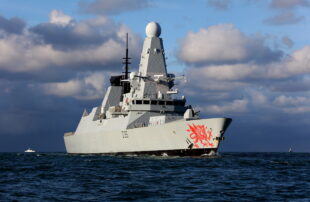 HMS Dragon, which last month took part in efforts to rescue 14 civilians from aboard the Clyde Challenger