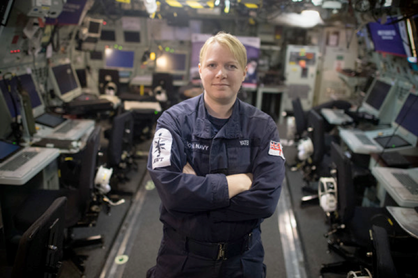 30 year old Leading Seaman Above Water Tactical Warfare Specialist, Kaylie Yates frm Broadstairs, poses for a photograph in the operations room on board HMS St Albans on March 7, 2017 in London, England. HMS St Albans is a Type 23 frigate of the Royal Navy. In 2006 she took a six-month deployment to the Gulf region to protect the Iraqi oil platforms and patrol duties in the Gulf. Members of her female crew have been invited to 10 Downing Street to a reception for International Women's day hosted by the Prime Minister, Theresa May.