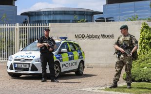 An Army Commando from a Royal Navy unit deployed on Operation Temperer in support of police. Almost 1000 Service personnel from all three Services have been deployed, and up to 3,800 additional personnel have been made available. 