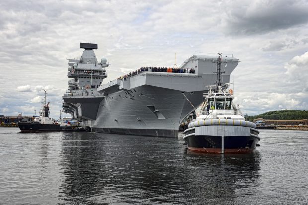 HMS Queen Elizabeth, the first QE Class aircraft carrier, set sail from Rosyth yesterday to commence first stage sea trials off the north-east of Scotland.
