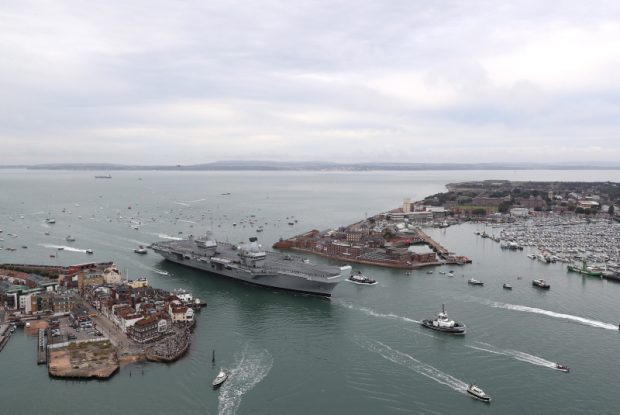 Britain's future flagship HMS Queen Elizabeth sailed into her home port of Portsmouth for the first time today.