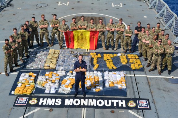 Royal Navy frigate HMS Monmouth has seized £65m of cannabis and heroin from a suspect vessel in the Indian Ocean, dealing a major blow to the funding of terrorism.