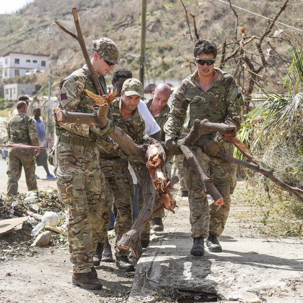 Picture shows Army Commandos delivering aid and providing support to British Virgin Islands communities.