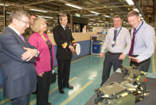 Defence Procurement Minister, Harriett Baldwin (Centre-left), meeting Thales staff at their Glasgow site in Scotland.  An innovative firm of Glaswegian engineers are celebrating 100 years of being the sole periscope and optronics mast supplier to the Royal Navys submarines.