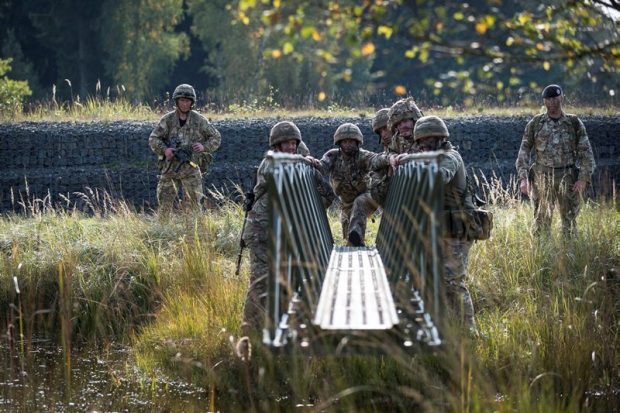 Reserve Engineers from 75 Engineer Regiment get to work building bridges in Germany. 